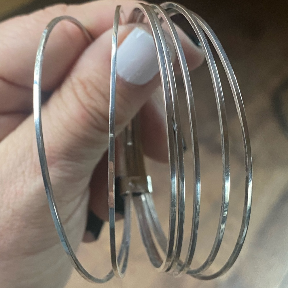 Gorgeous set of 7 Smooth sterling silver bangles